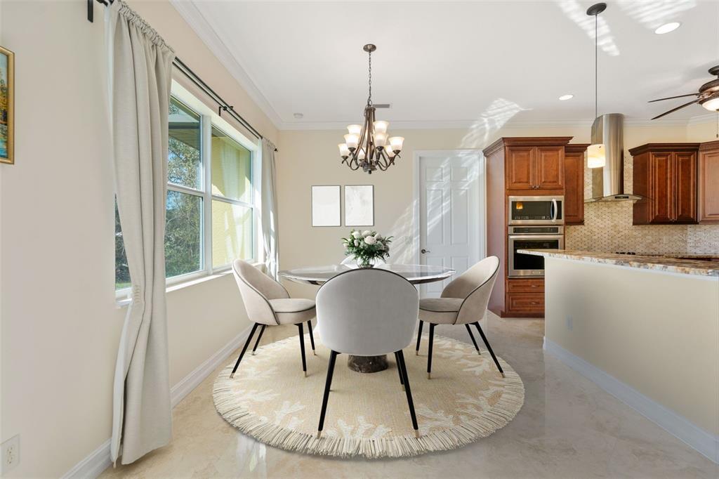 1900 Colleen Street Sarasota, FL 34231 - Photo 19 of 49 a view of a dining room with furniture window and wooden floor
