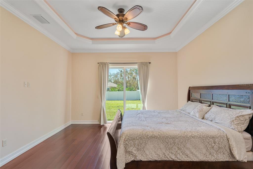 1900 Colleen Street Sarasota, FL 34231 - Photo 22 of 49 a bedroom with a bed and a window