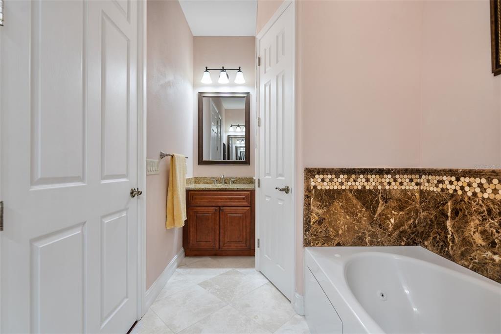 1900 Colleen Street Sarasota, FL 34231 - Photo 27 of 49 a bathroom with a bathtub and shower