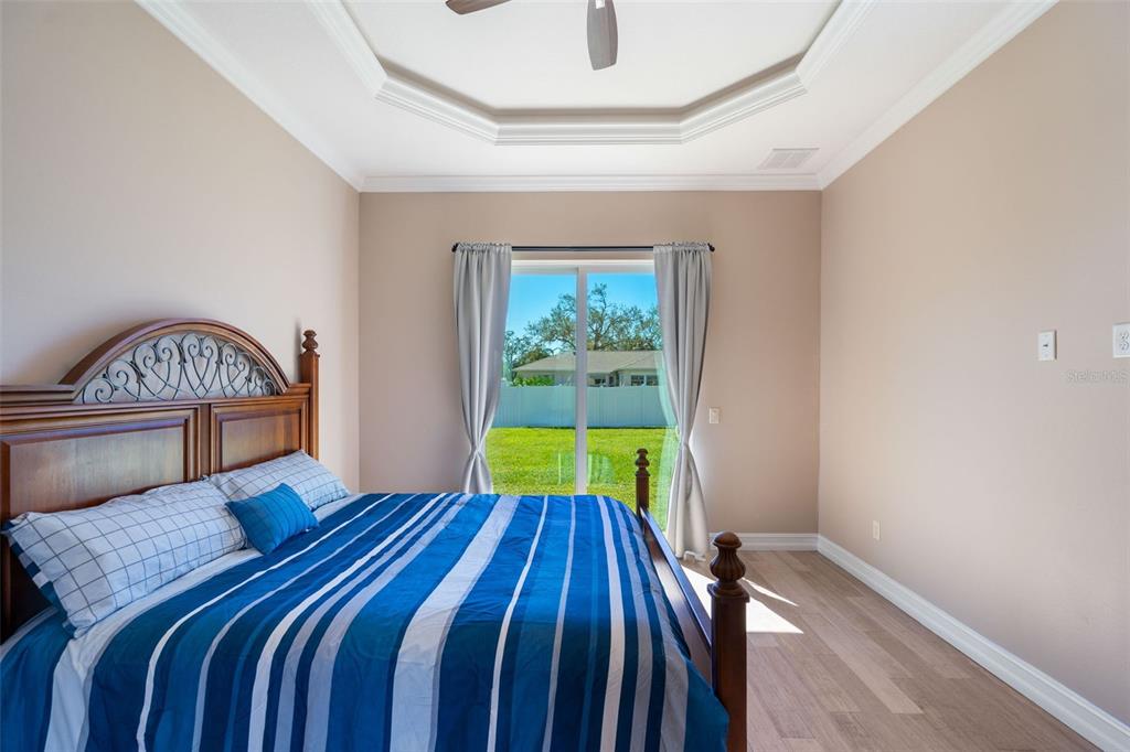 1900 Colleen Street Sarasota, FL 34231 - Photo 38 of 49 a bedroom with a bed and a window