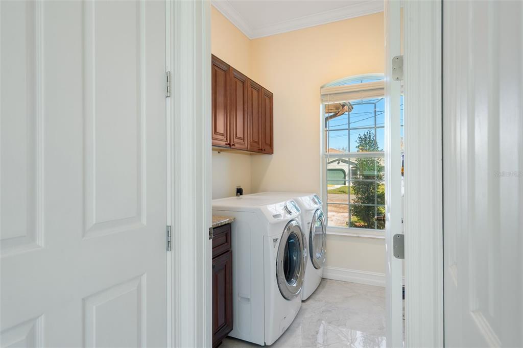 1900 Colleen Street Sarasota, FL 34231 - Photo 43 of 49 a utility room with dryer and washer