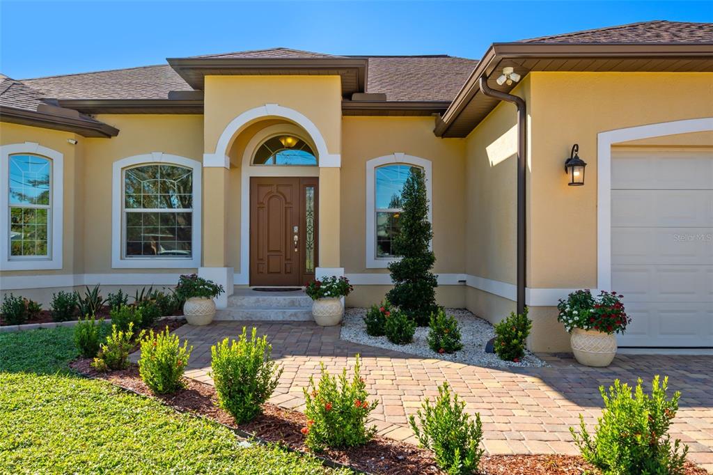 1900 Colleen Street Sarasota, FL 34231 - Photo 5 of 49 a front view of a house with a yard