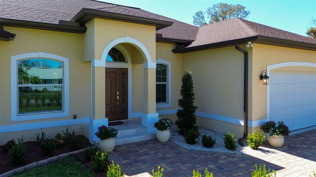 1900 Colleen Street Sarasota, FL 34231 - Photo 6 of 49 a front view of a house with garden