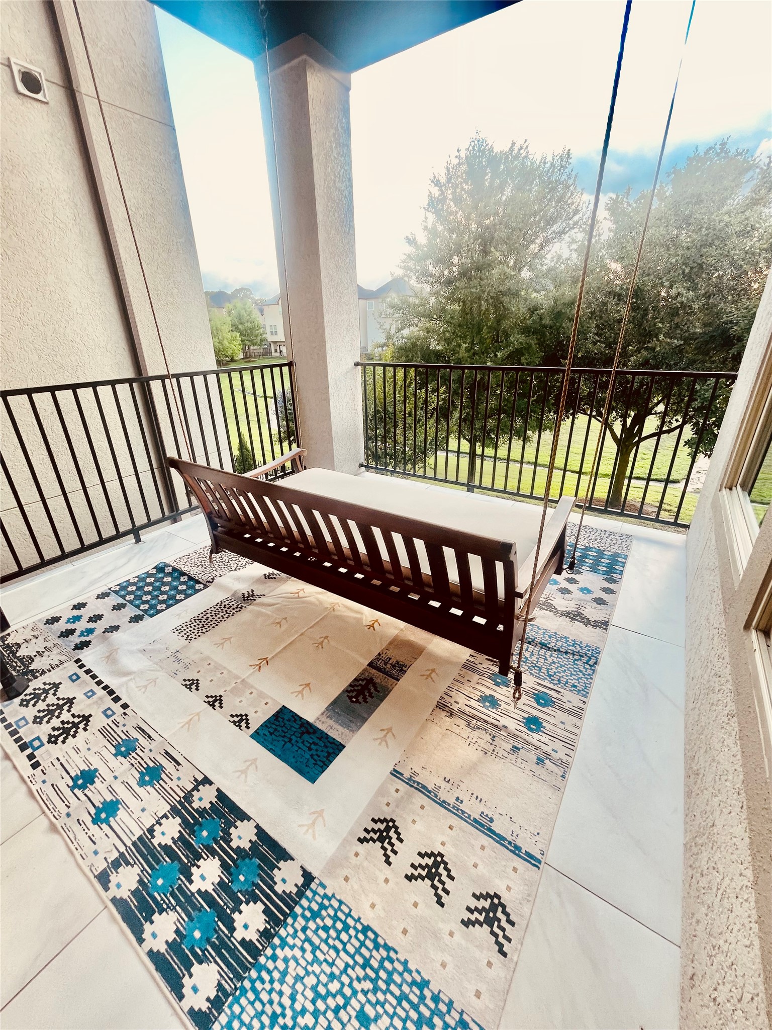 10215 Spring Shadows Park Circle Houston, TX 77080 - Photo 17 of 44 Balcony with swing. Easy access from second/main level.