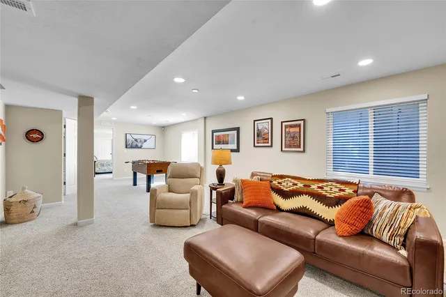 a living room with furniture and a couch