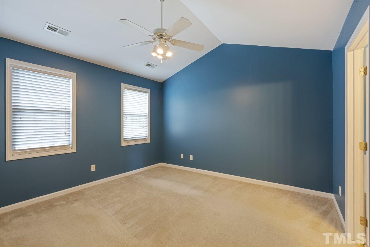 710 Windcrest Road Durham, NC 27713 - Photo 17 of 30 a view of an empty room with chandelier fan