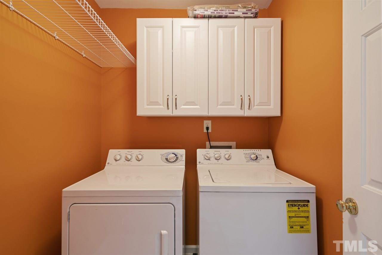 710 Windcrest Road Durham, NC 27713 - Photo 25 of 30 a utility room with dryer and washer