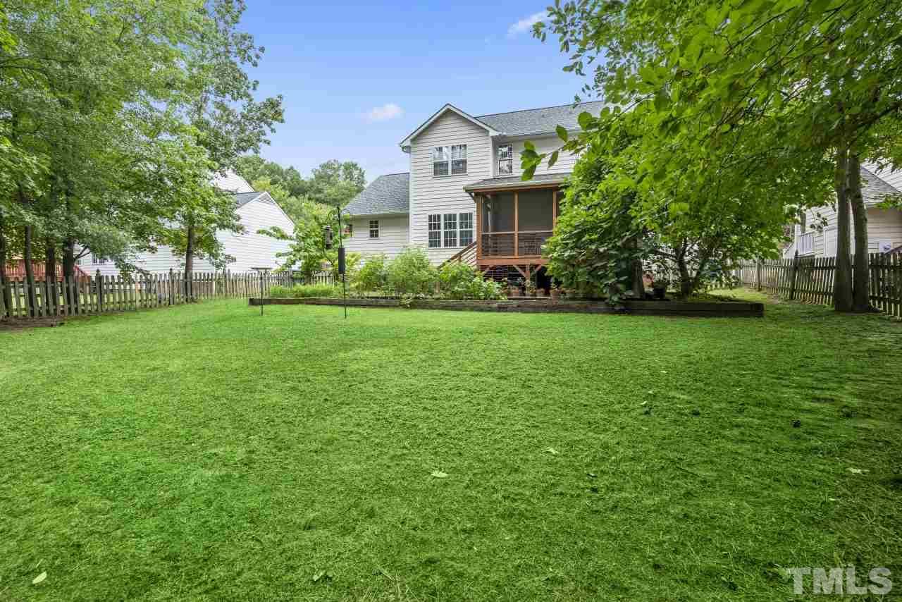 710 Windcrest Road Durham, NC 27713 - Photo 26 of 30 a view of a house with a big yard and large trees