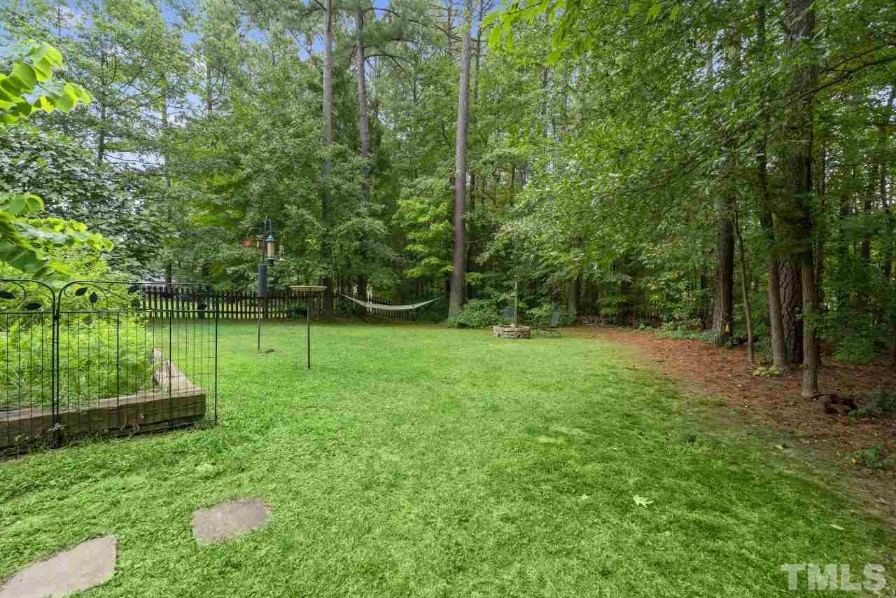 710 Windcrest Road Durham, NC 27713 - Photo 28 of 30 a view of a backyard with a garden