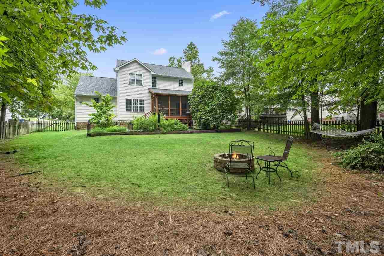 710 Windcrest Road Durham, NC 27713 - Photo 29 of 30 a view of a house with a yard and sitting area