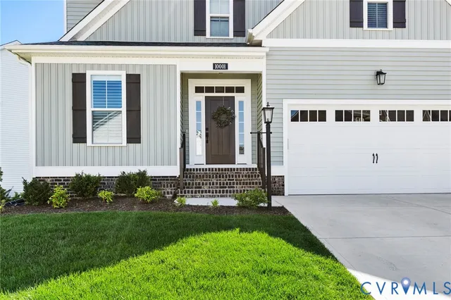 front view of a house with a yard