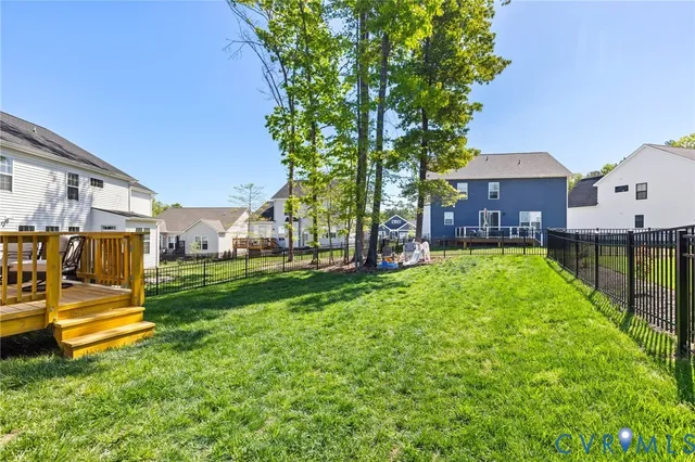 a view of a house with a big yard
