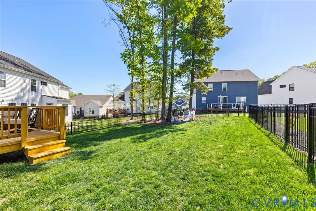 10001 Craftsbury Drive Midlothian, VA 23112 - Photo 32 of 32 a view of a house with a big yard