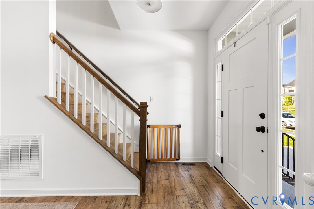 10001 Craftsbury Drive Midlothian, VA 23112 - Photo 5 of 32 a view of an entryway with wooden floor