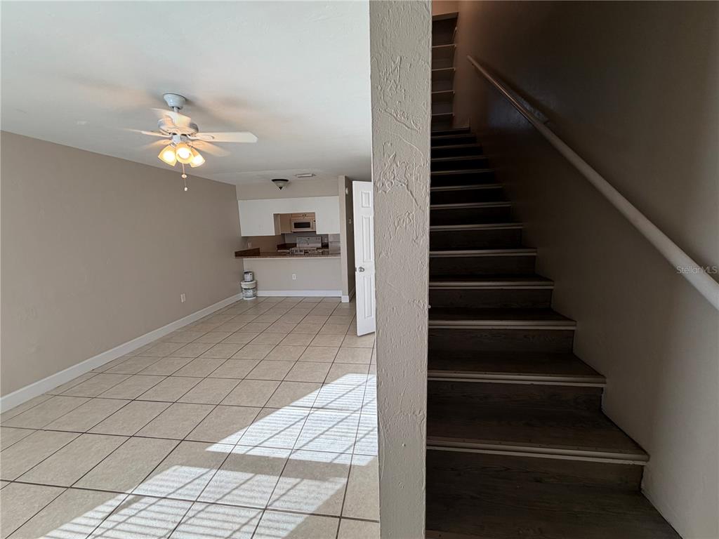 1718 Southwest 69th Terrace, Unit C Gainesville, FL 32607 - Photo 13 of 14 a view of entryway and hall with wooden floor