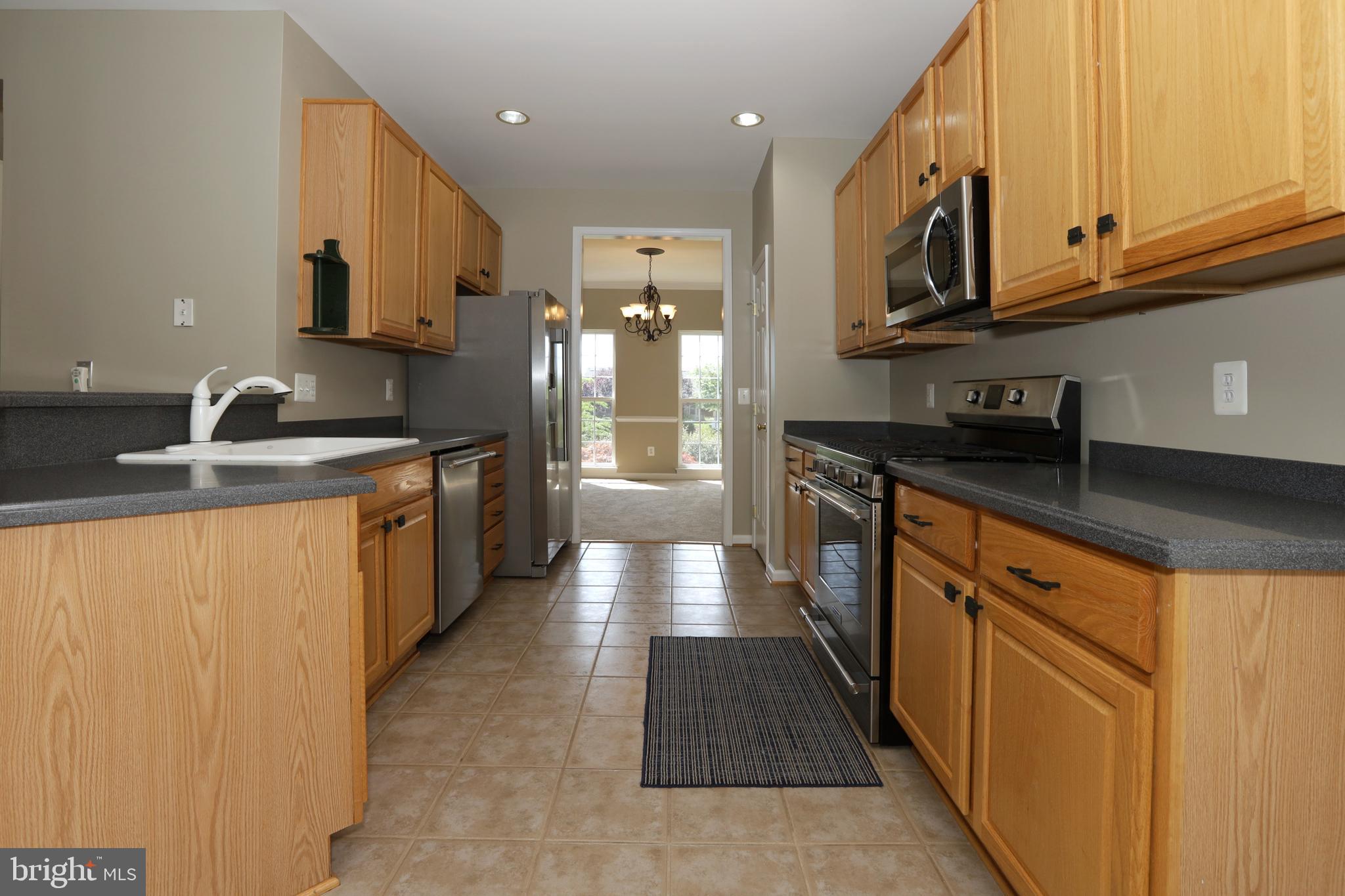 14205 Reidhall Place Gainesville, VA 20155 - Photo 12 of 54 Kitchen view from kitchen eating area