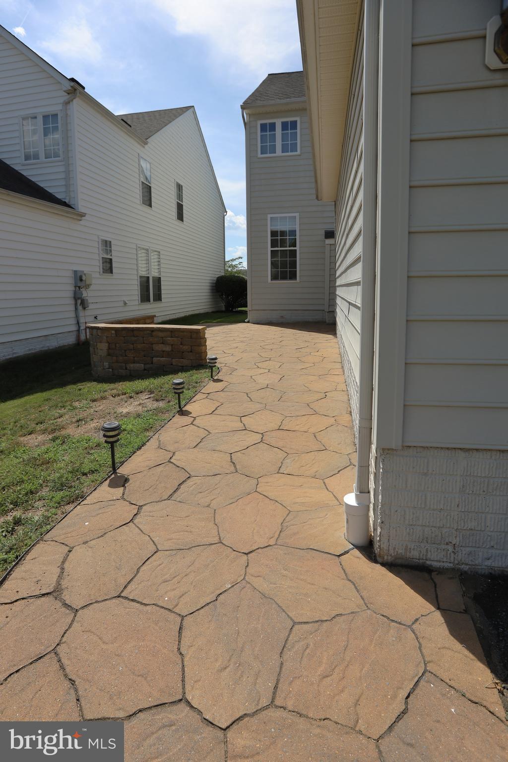 14205 Reidhall Place Gainesville, VA 20155 - Photo 40 of 54 Walk to patio from drive