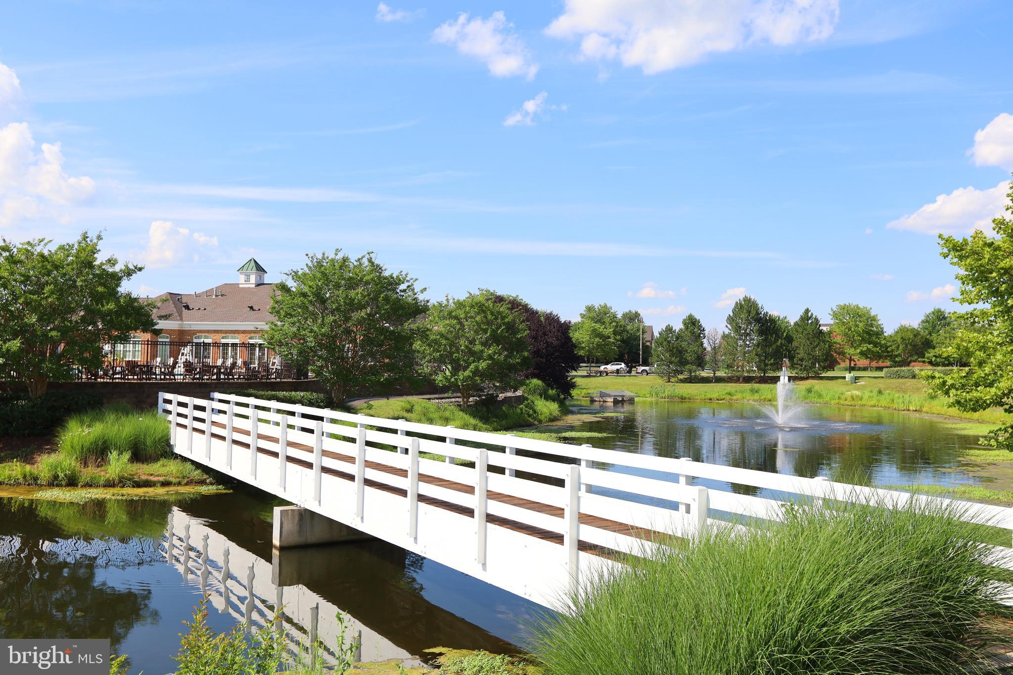 14205 Reidhall Place Gainesville, VA 20155 - Photo 47 of 54 Bridge across lake to the clubhouse and pool!