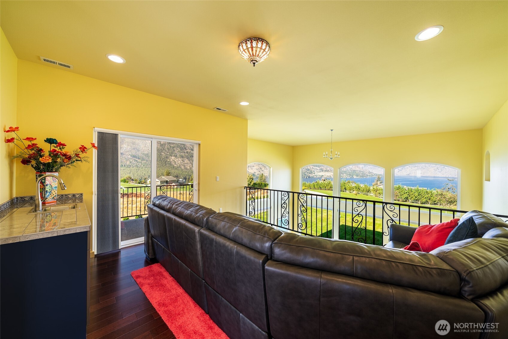 555 Loop Avenue Manson, WA 98831 - Photo 24 of 33 a living room with furniture and a flat screen tv