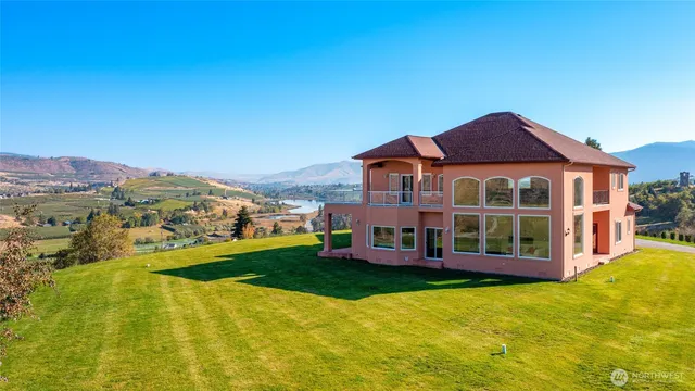 a view of an ocean and a mountain