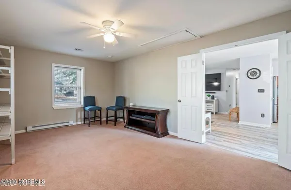 a view of livingroom with furniture and windows