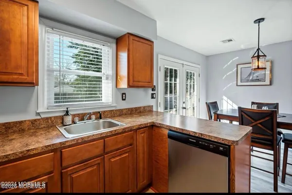 a kitchen with granite countertop a sink and a granite counter tops