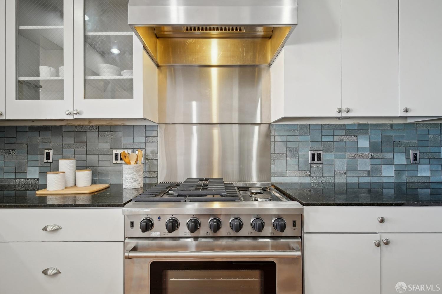 20 Wright Street San Francisco, CA 94110 - Photo 10 of 34 a kitchen with a stove and cabinets