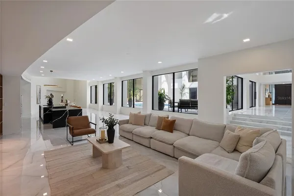a view of a chairs and table in a room