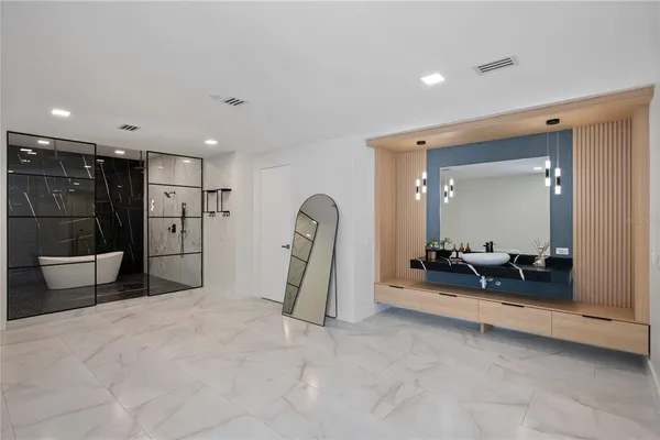 a bathroom with a granite countertop