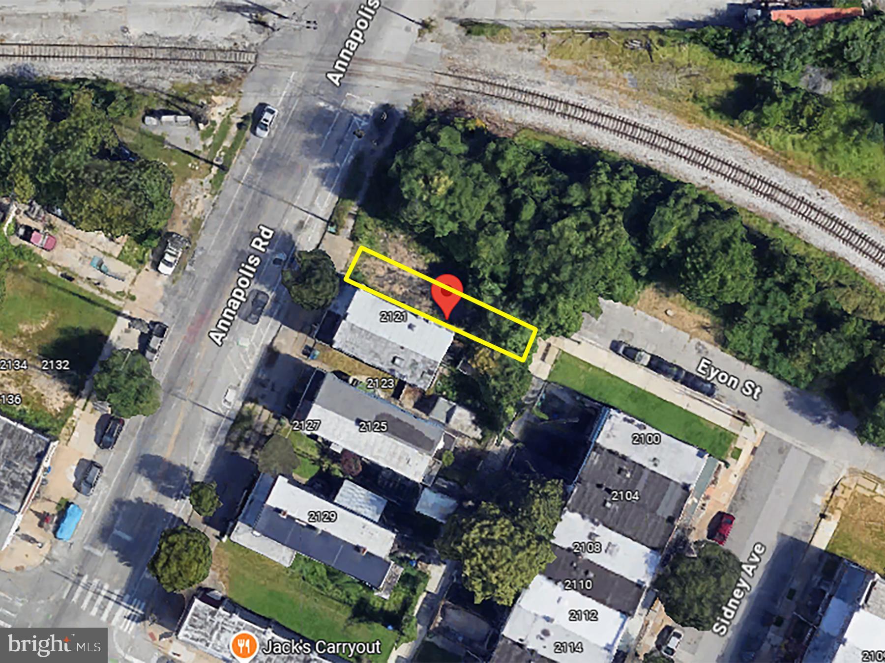 2119 Annapolis Road Baltimore, MD 21230 - Photo 1 of 2 an aerial view of a house with a yard and outdoor seating