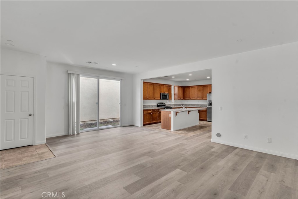 687 South Fillmore Avenue Rialto, CA 92376 - Photo 11 of 39 a view of a kitchen with a sink and a window