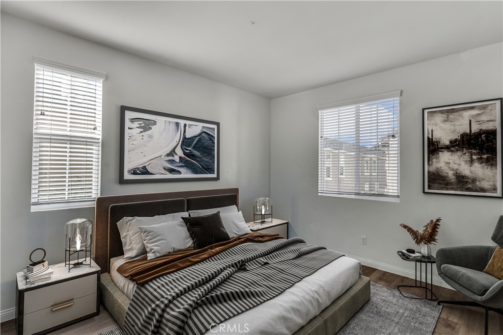 687 South Fillmore Avenue Rialto, CA 92376 - Photo 27 of 39 a bedroom with furniture and a window