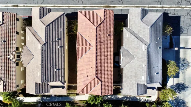 a view of a house with a street