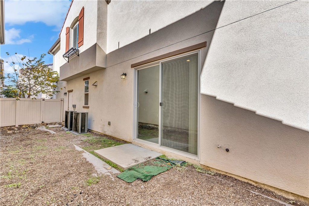 687 South Fillmore Avenue Rialto, CA 92376 - Photo 39 of 39 a view of a front door and outdoor space