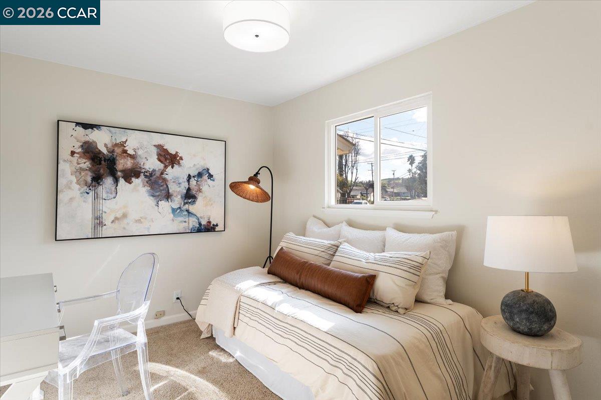4095 Hamlet Drive Concord, CA 94521 - Photo 14 of 26 a bedroom with a bed and a window