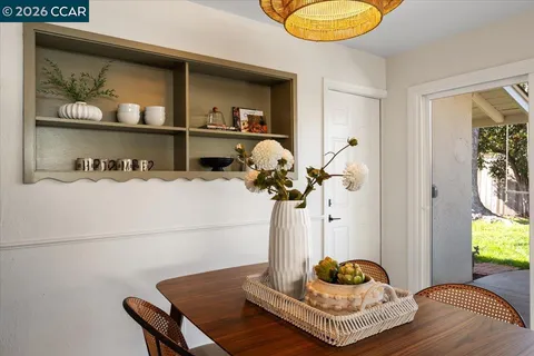 a living room with furniture and decor