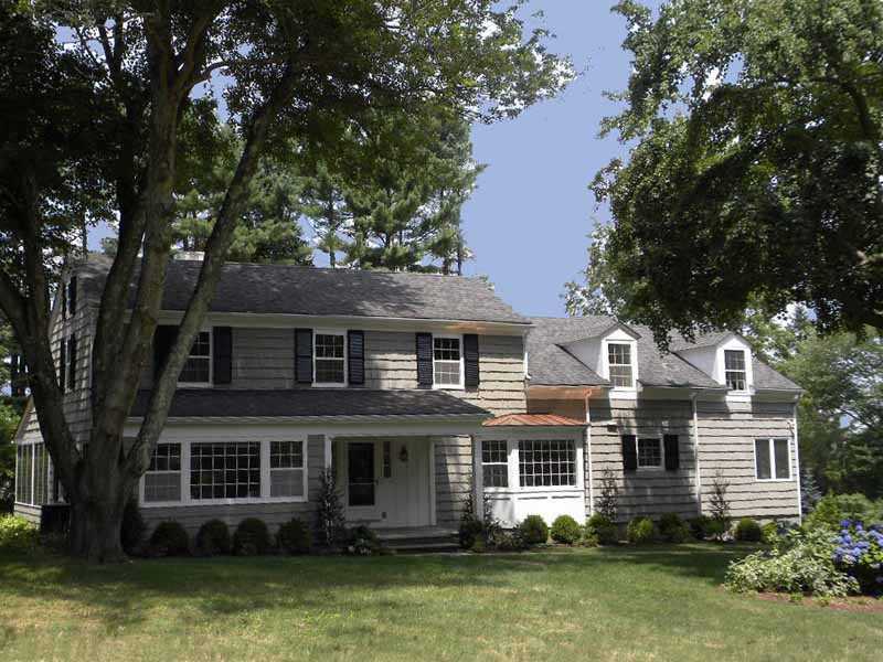 67 Peach Hill Road Darien, CT 06820 - Photo 1 of 25 front view of a house with a yard