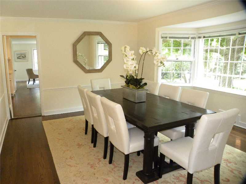 67 Peach Hill Road Darien, CT 06820 - Photo 11 of 25 a view of a dining room with furniture and wooden floor