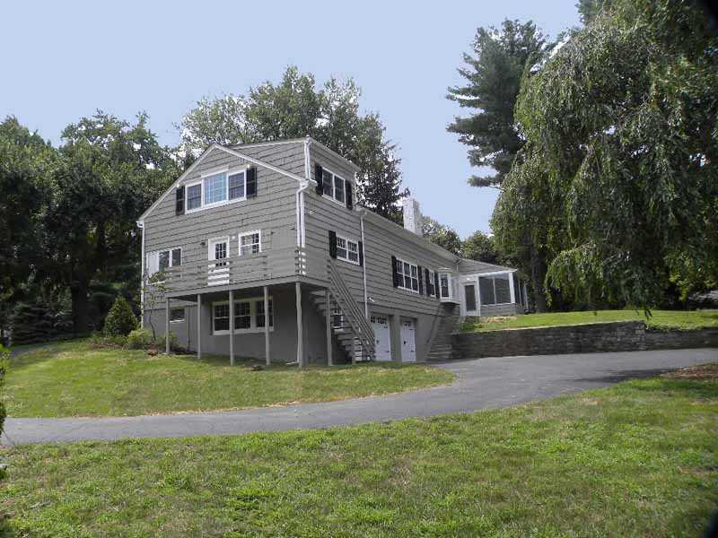 67 Peach Hill Road Darien, CT 06820 - Photo 25 of 25 a front view of a house with a yard