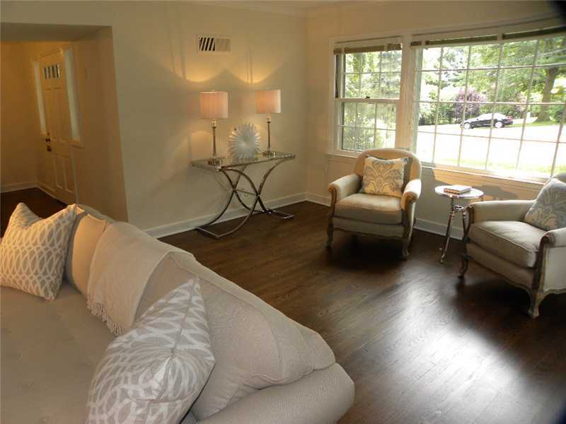 67 Peach Hill Road Darien, CT 06820 - Photo 6 of 25 a living room with furniture and a large window