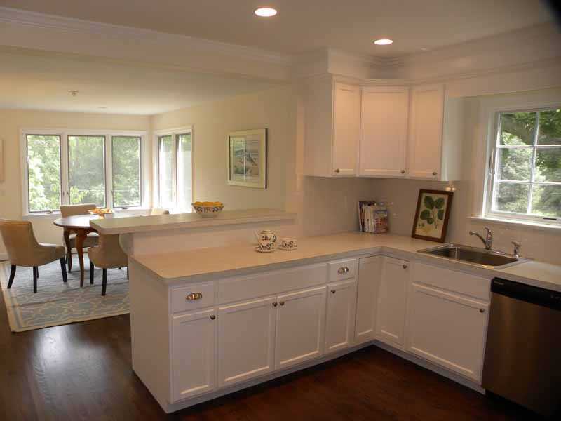 67 Peach Hill Road Darien, CT 06820 - Photo 7 of 25 a kitchen with a sink window and cabinets