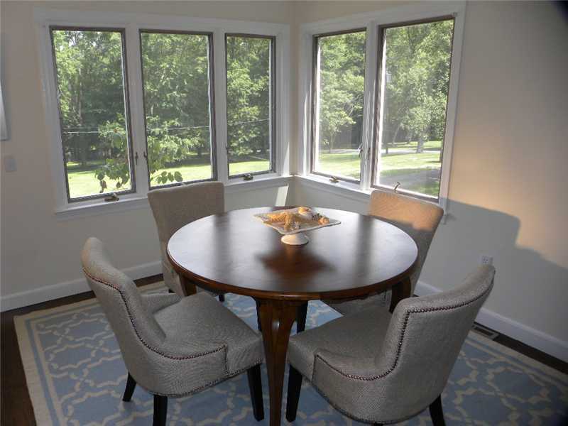 67 Peach Hill Road Darien, CT 06820 - Photo 10 of 25 a view of a dining room with furniture window and outside view