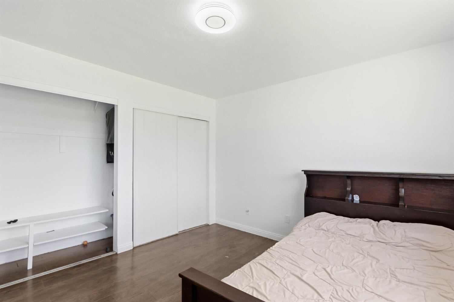 7208 7th Street Rio Linda, CA 95673 - Photo 24 of 41 a bedroom with a bed and a window