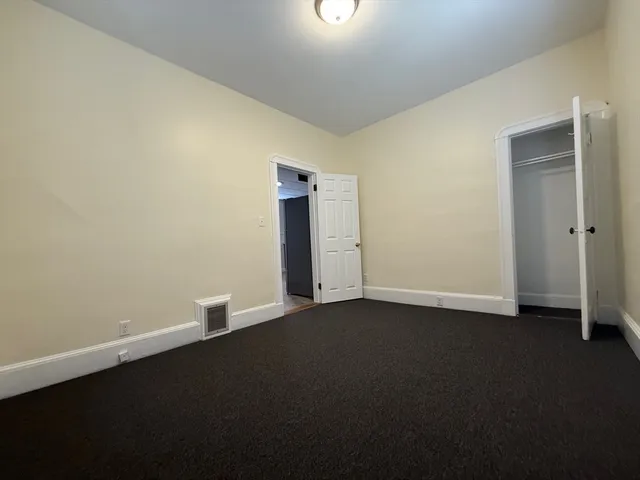 an empty room with a door