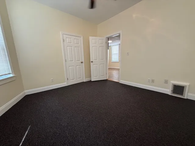 an empty room with a door