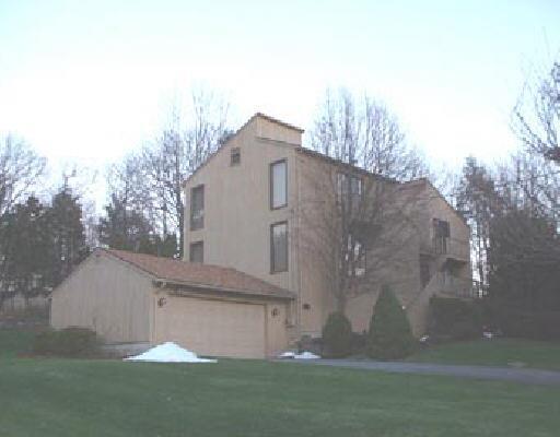 283 Putting Green Road Trumbull, CT 06611 - Photo 1 of 1 a view of a small house with a yard