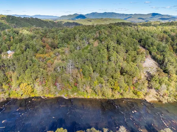 a view of mountain with lake view