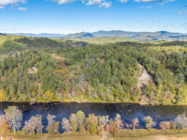 a view of a lake with a mountain