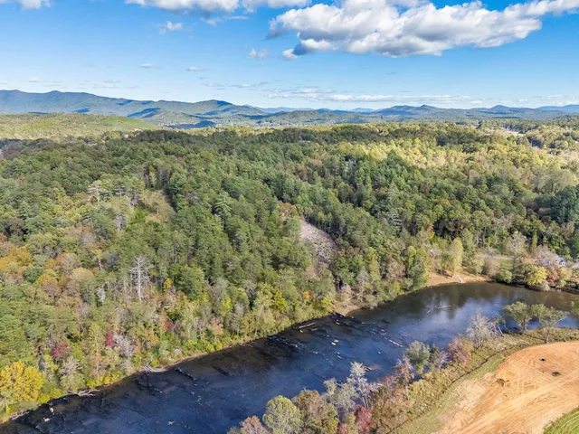 a view of a lake with a mountain
