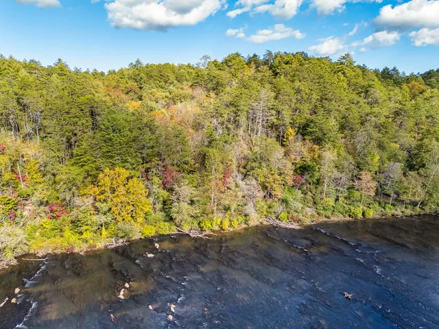 a view of a lake with beach